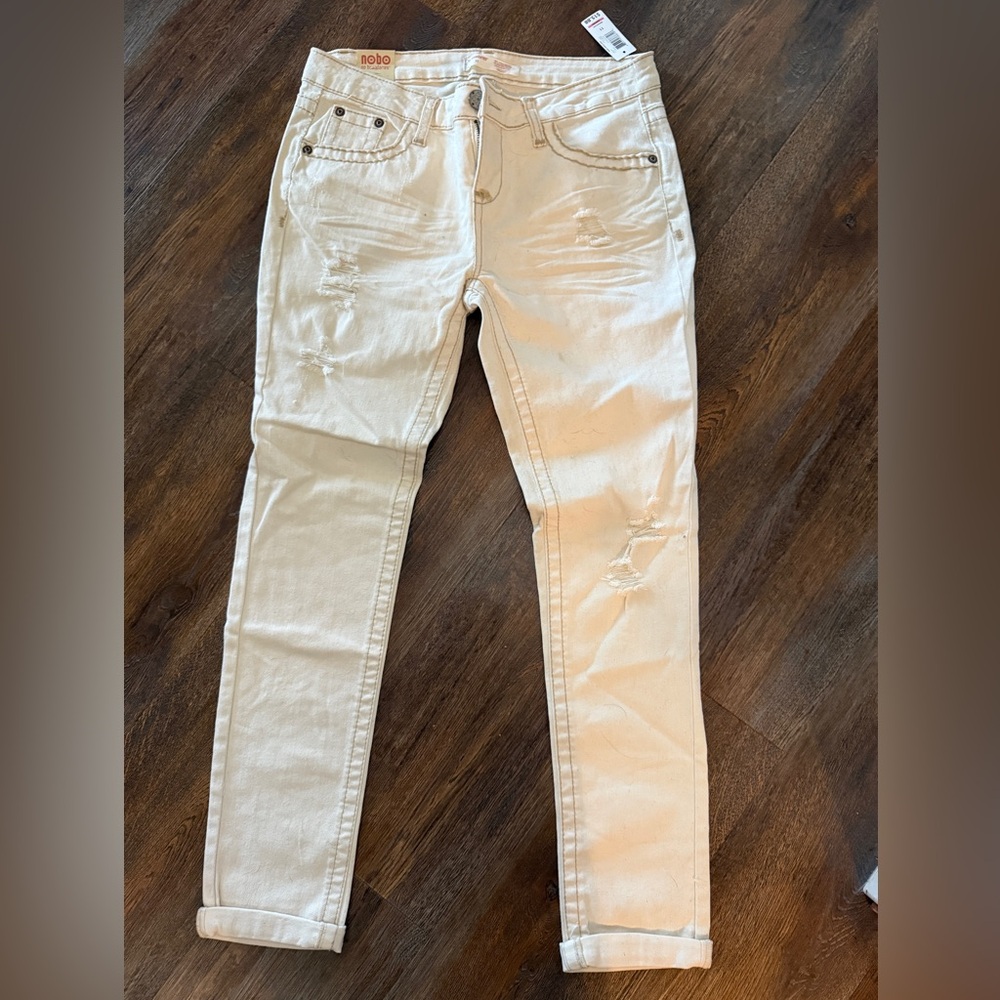 Cream Colored Distressed Jeans